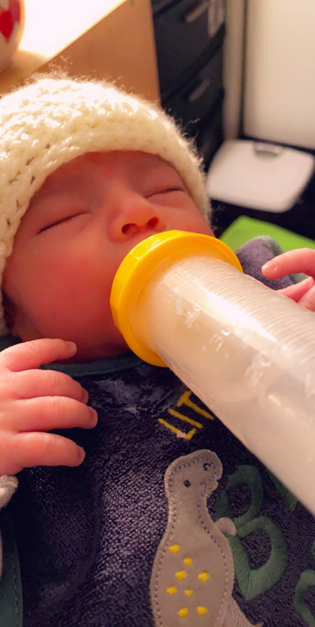 Milo joined the competition — help win amazing prizes! baby, baby_bottle, baby_products, bottle, child, drinking, drinkware, finger, hand, headwear, infant_formula, mouth, nail, nose, person, play, product, skin, tableware, toddler