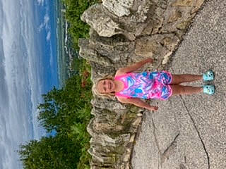 Kendall joined the competition — help win amazing prizes! adventure, asphalt, azure, blurred, electric_blue, fun, grass, human_leg, joy, landscape, leisure, mountain, person, recreation, rock, sidewalk, sky, soil, toddler, travel