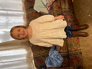 Kendall joined the competition — help win amazing prizes! bedding, child, comfort, elbow, floor, flooring, foot, fun, hardwood, human_leg, joy, linens, pattern, person, room, sleeve, smile, thigh, thumb, toddler