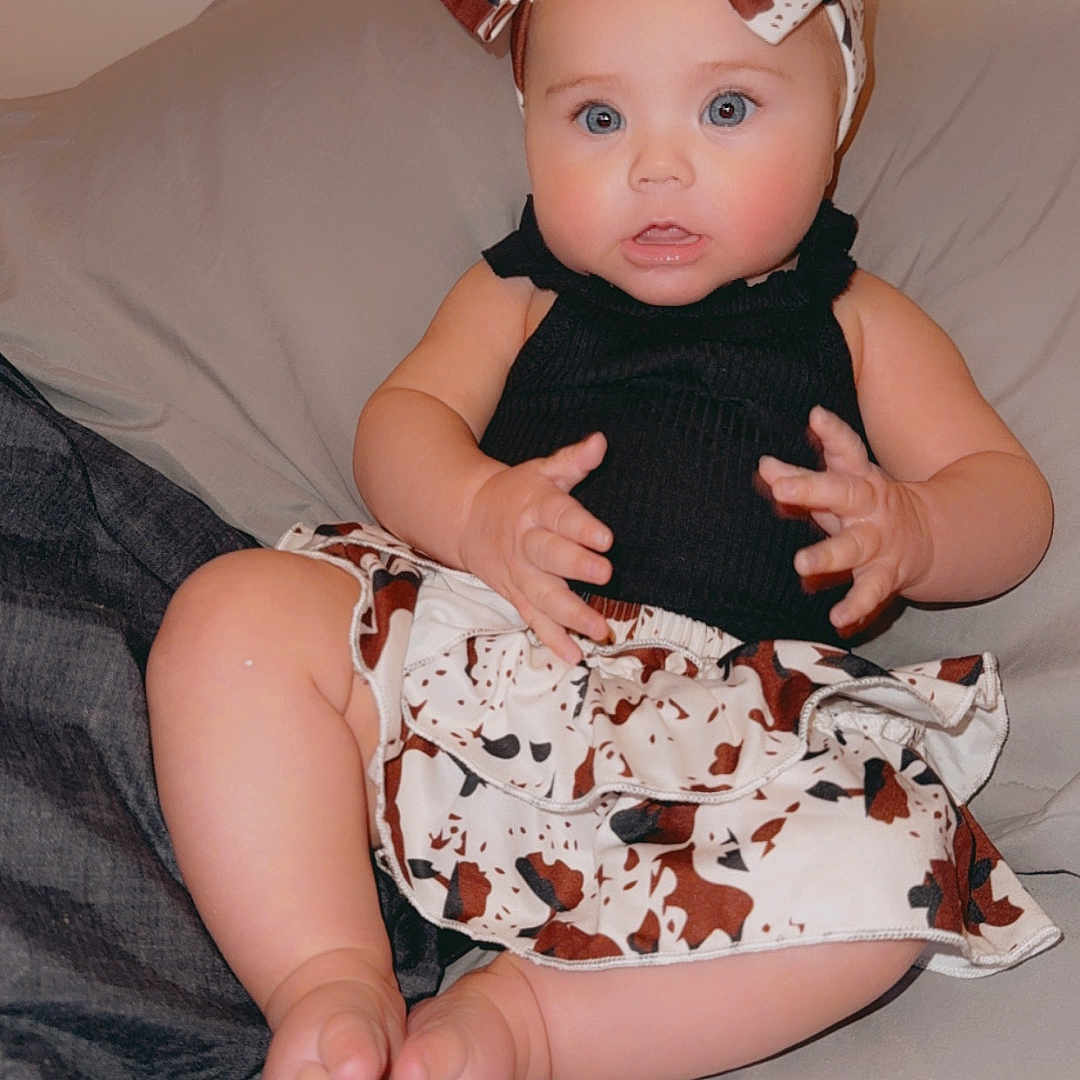 Gracelyn joined the competition — help win amazing prizes! accessories, baby, bodypart, bonnet, clothing, couch, cushion, dress, face, finger, formalwear, furniture, hand, hat, head, homedecor, person, photography, portrait, sitting