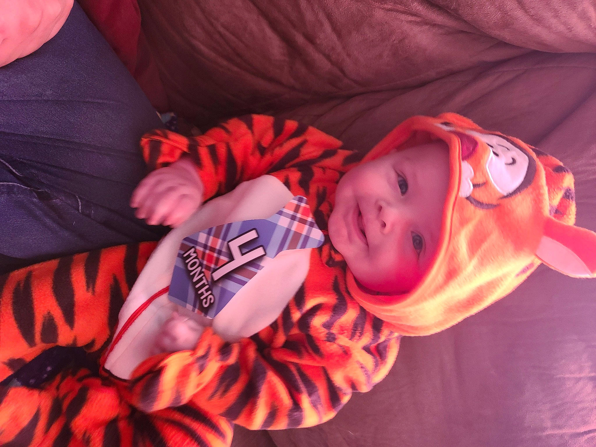 Jayden is registered to the contest to win money with this photo: child, headwear, orange, person