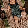 baby, infant, two_months, headband, romper, lying_down, blanket, green, wooden_sign, milestone, cute, child, soft_lighting, portrait, indoors, foot, hand, skin, expression, cushion