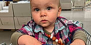 Raphael participe au concours pour gagner de l'argent avec cette photo : advertisement, airport, baby, clothing, face, grocerystore, head, indoors, market, person, photography, portrait, poster, shop, shopping, shoppingcart, sleeve, student, supermarket, text