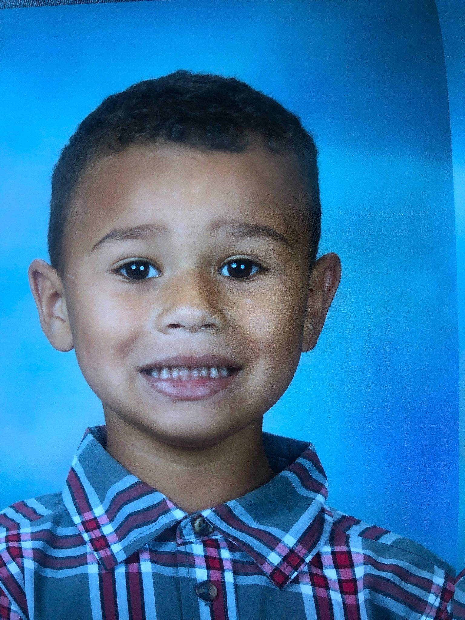 Letravious is registered to the contest to win money with this photo: blue, boy, cheek, child, chin, ear, eye, eyebrow, face, facial_expression, forehead, fun, head, human, jaw, joy, person, portrait, portrait_photography, sky