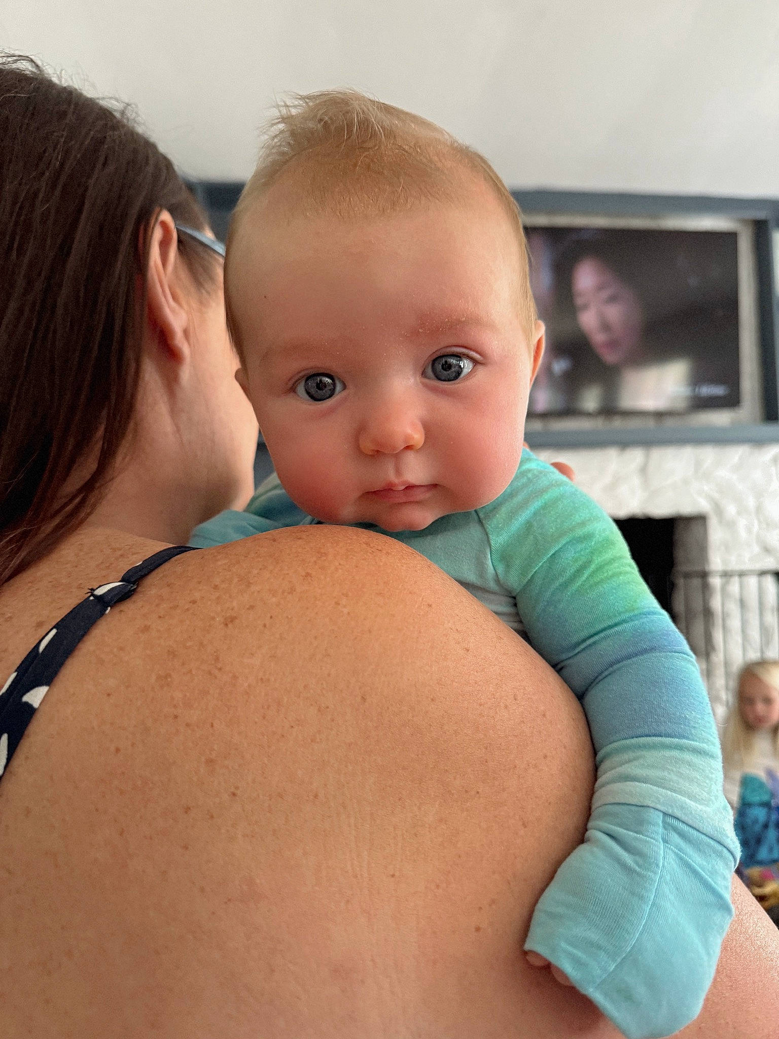 Carson is registered to the contest to win money with this photo: abdomen, azure, baby, cheek, chest, chin, elbow, face, head, human_body, interaction, joint, muscle, neck, person, shoulder, skin, stomach, thigh, toddler