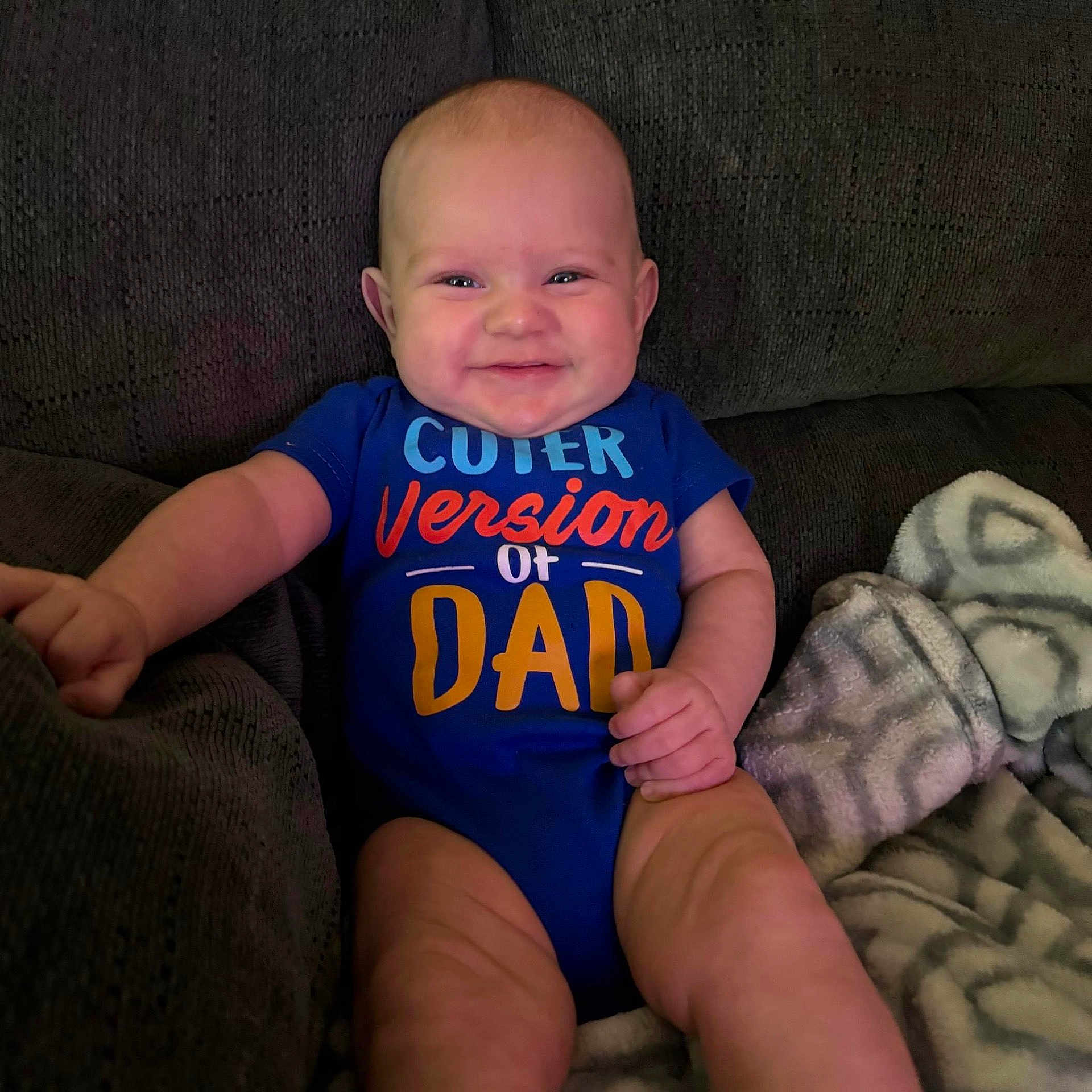 Xane is registered to the contest to win money with this photo: baby, babylaughing, cushion, face, happy, head, homedecor, laughing, person, photography, portrait, sitting, smile