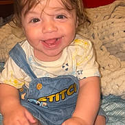 Haevin joined the competition — help win amazing prizes! baby, child, smiling, denim_overalls, stitch, blanket, indoors, happy, cute, toddler, clothing, face, hands, feet, sitting, portrait, hair, skin, person, candid