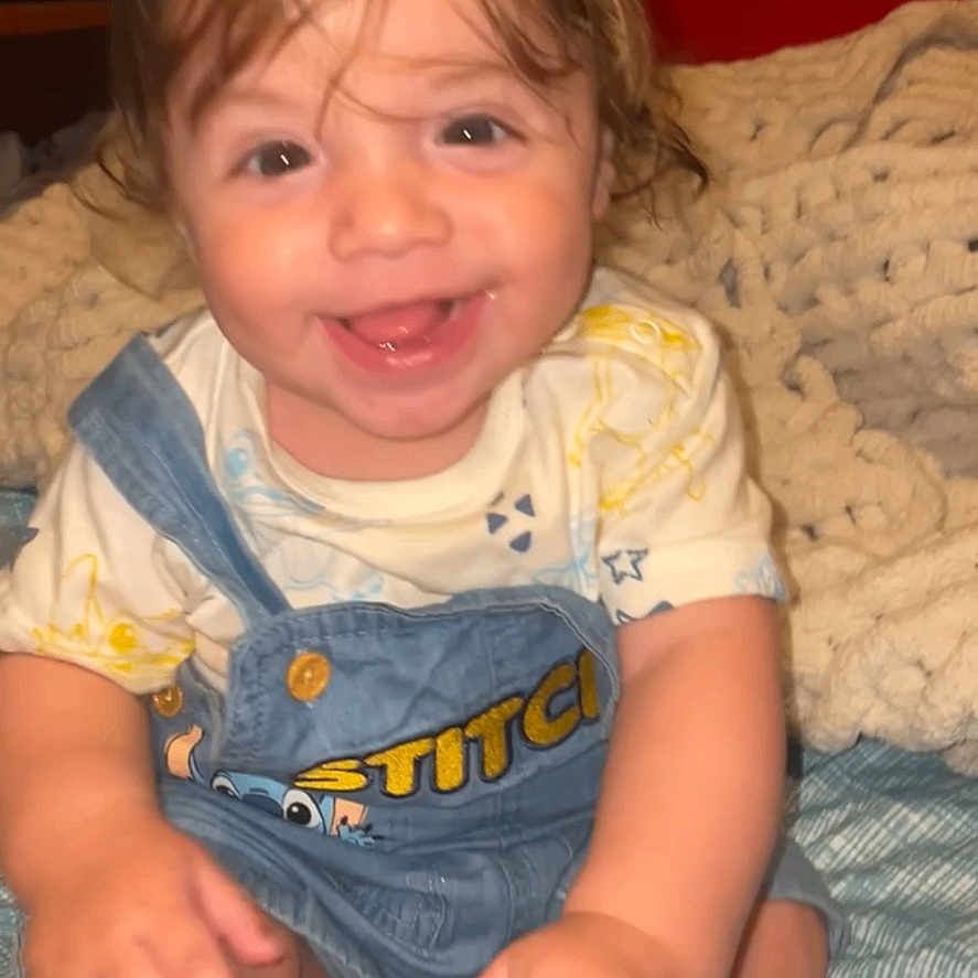 Haevin joined the competition — help win amazing prizes! baby, blanket, candid, child, clothing, cute, denim_overalls, face, feet, hair, hands, happy, indoors, person, portrait, sitting, skin, smiling, stitch, toddler