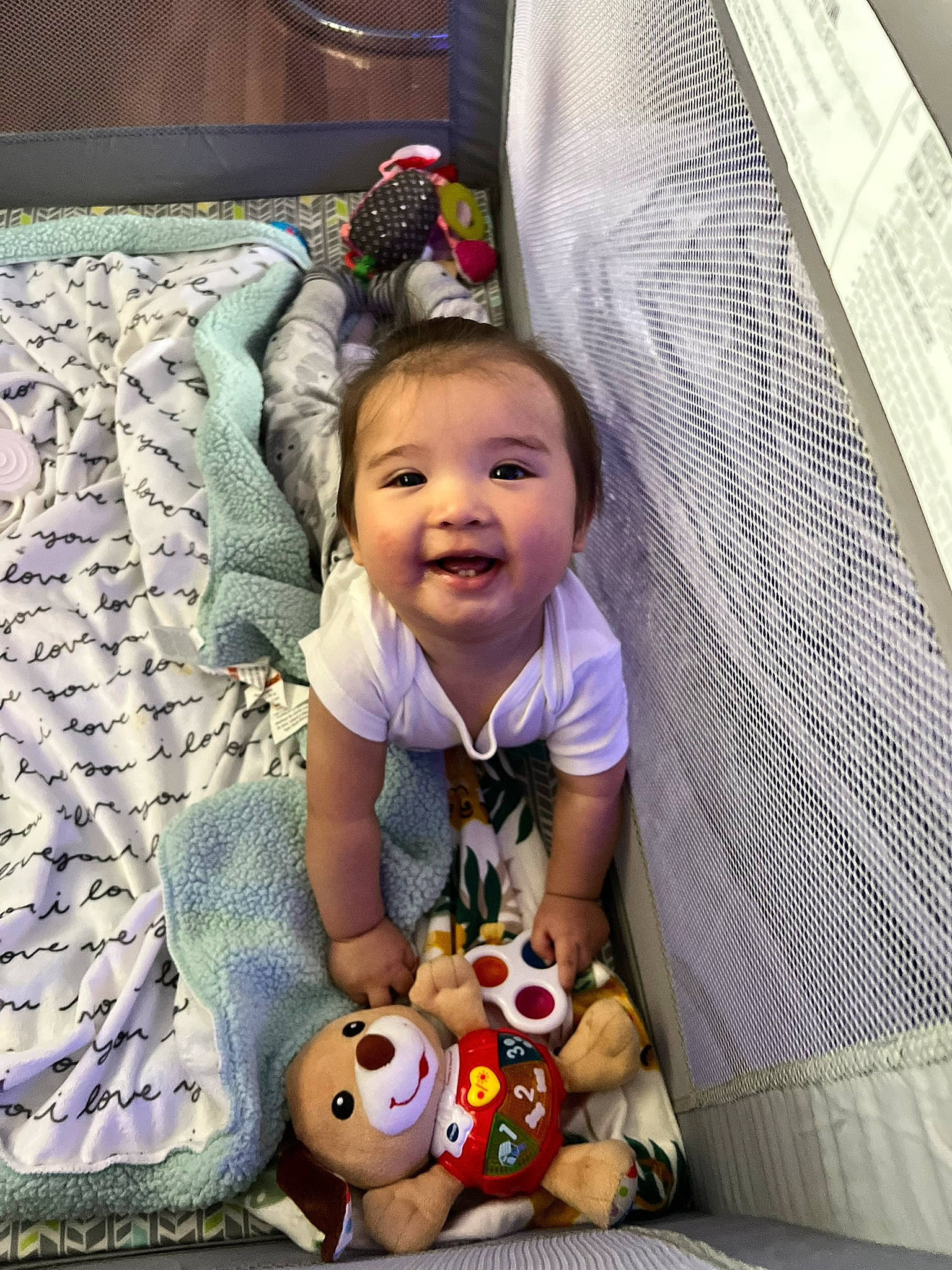 Charles is registered to the contest to win money with this photo: baby, baby_products, baby_toddler_clothing, child, comfort, companion_dog, flooring, fun, happy, head, joy, linens, organ, people, person, sitting, smile, snapshot, t_shirt, textile
