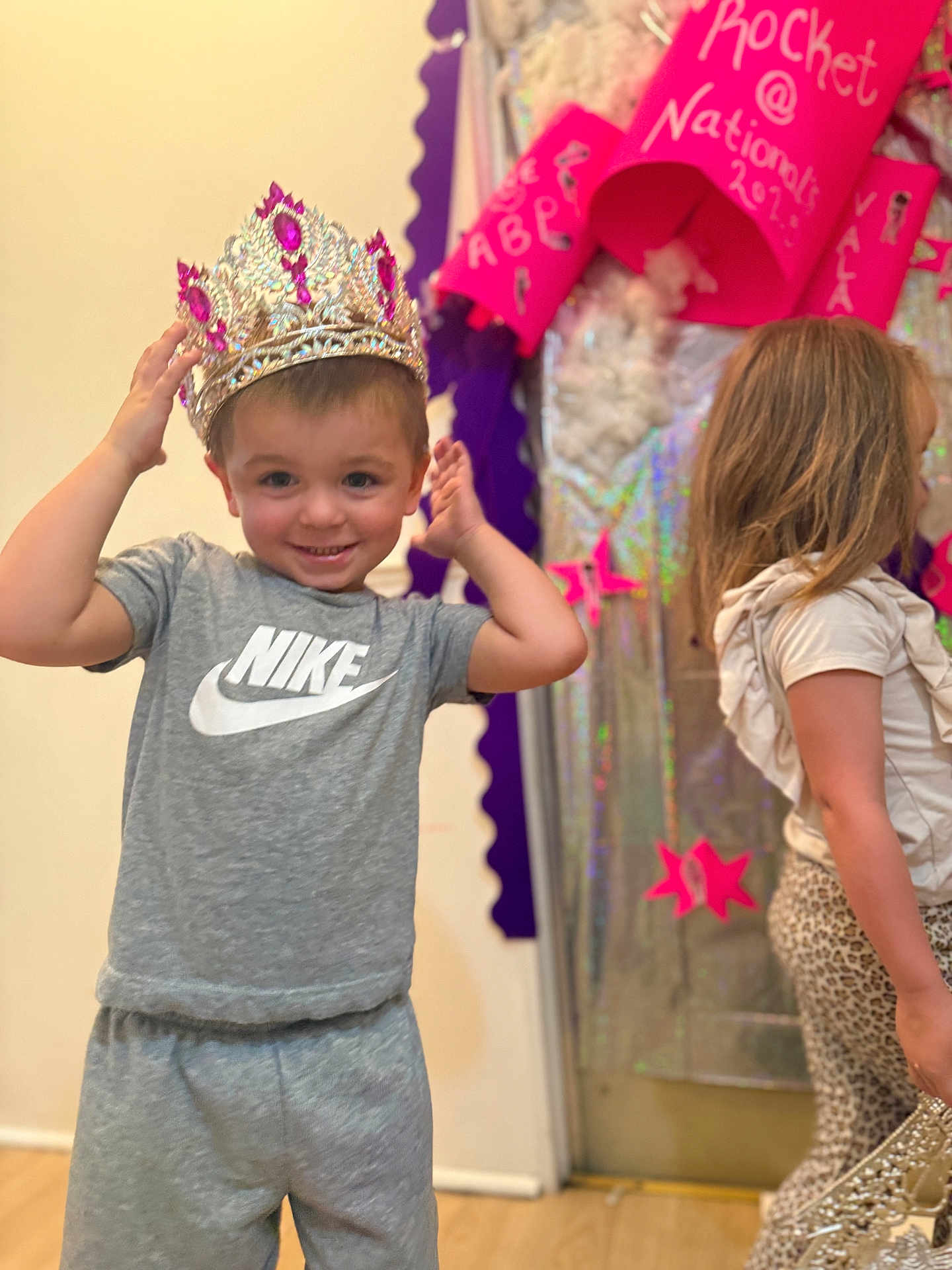 Jeremy joined the competition — help win amazing prizes! child, boy, girl, crown, nike, grey_clothing, leopard_print, indoor, smile, decorations, door, floor, happy, standing, person, young_child, casual_clothing, background, celebration, playful