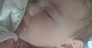 Hazel is registered to the contest to win money with this photo: baby, sleeping, blanket, face, infant, child, soft, peaceful, closeup, cuddle, pink, skin, portrait, rest, young, cozy, head, ear, calm, nap