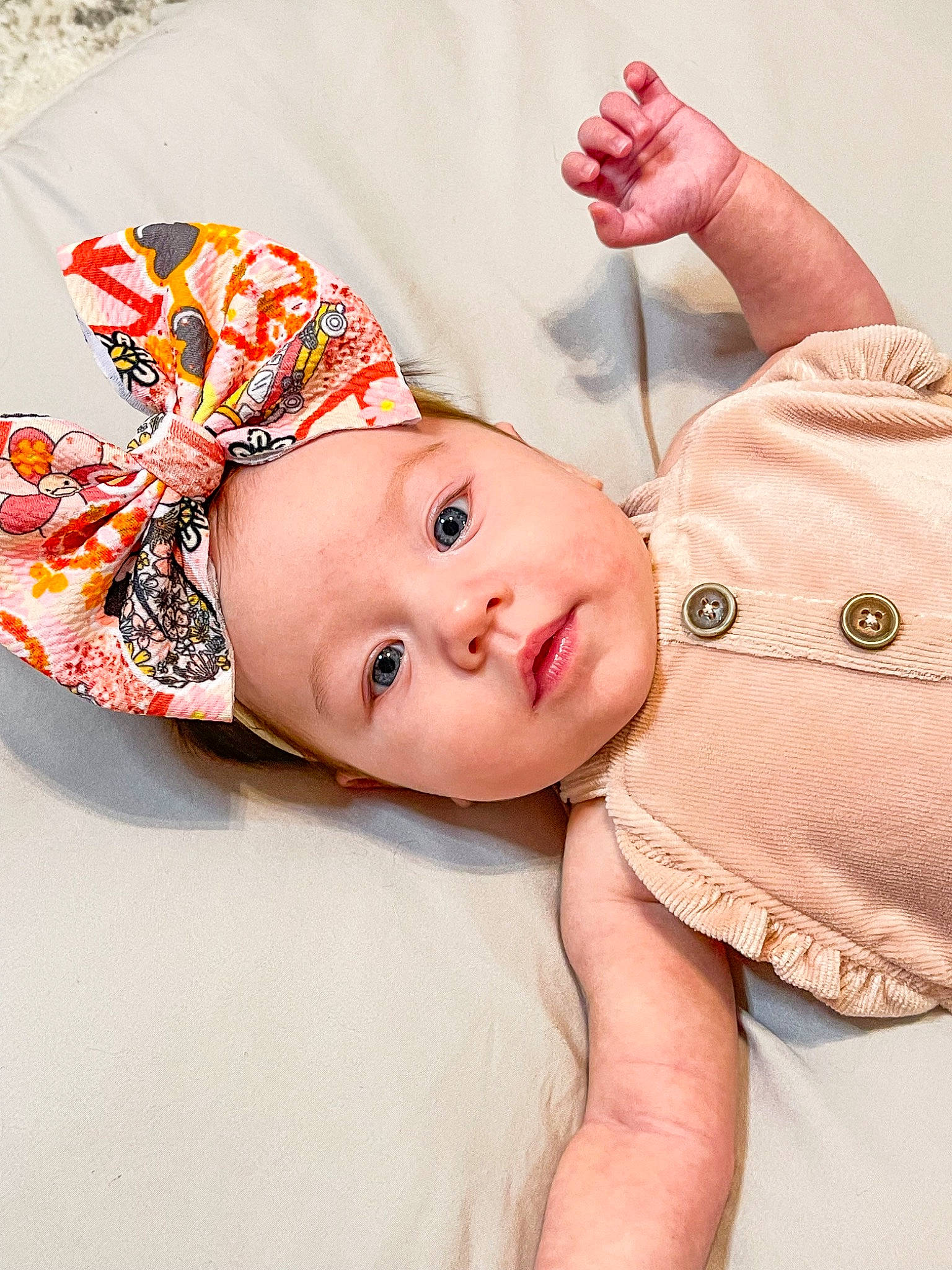 Huxley is registered to the contest to win money with this photo: baby, baby_products, baby_sleeping, baby_toddler_clothing, cap, cheek, child, collar, comfort, fashion_accessory, gesture, happy, head, headgear, headwear, lip, pattern, person, pink, skin