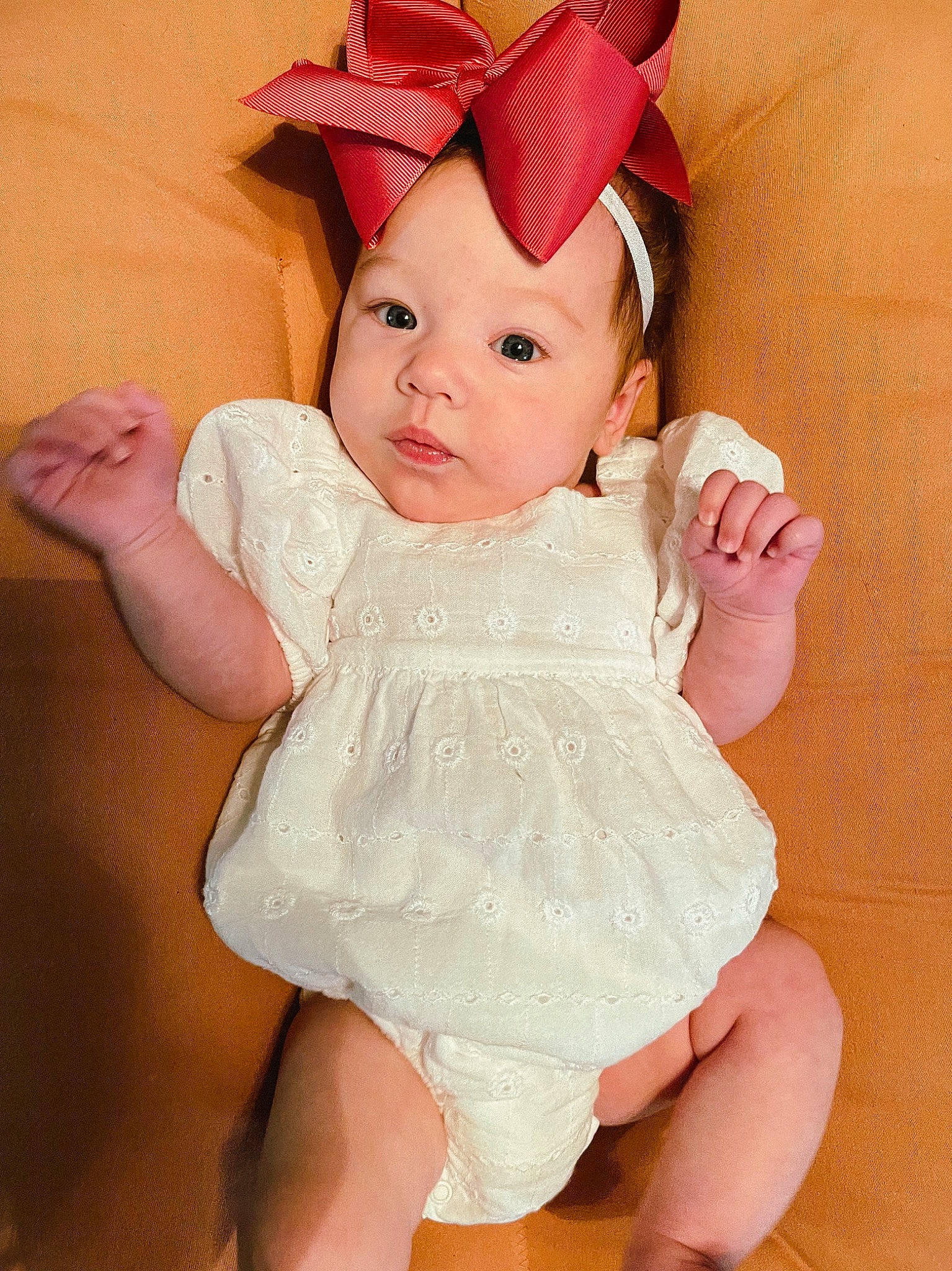 Huxley joined the competition — help win amazing prizes! baby, baby_toddler_clothing, costume_hat, day_dress, eye, face, finger, gesture, head, headgear, human_body, lip, one_piece_garment, person, pink, skin, sleeve, sun_hat, thumb, toddler