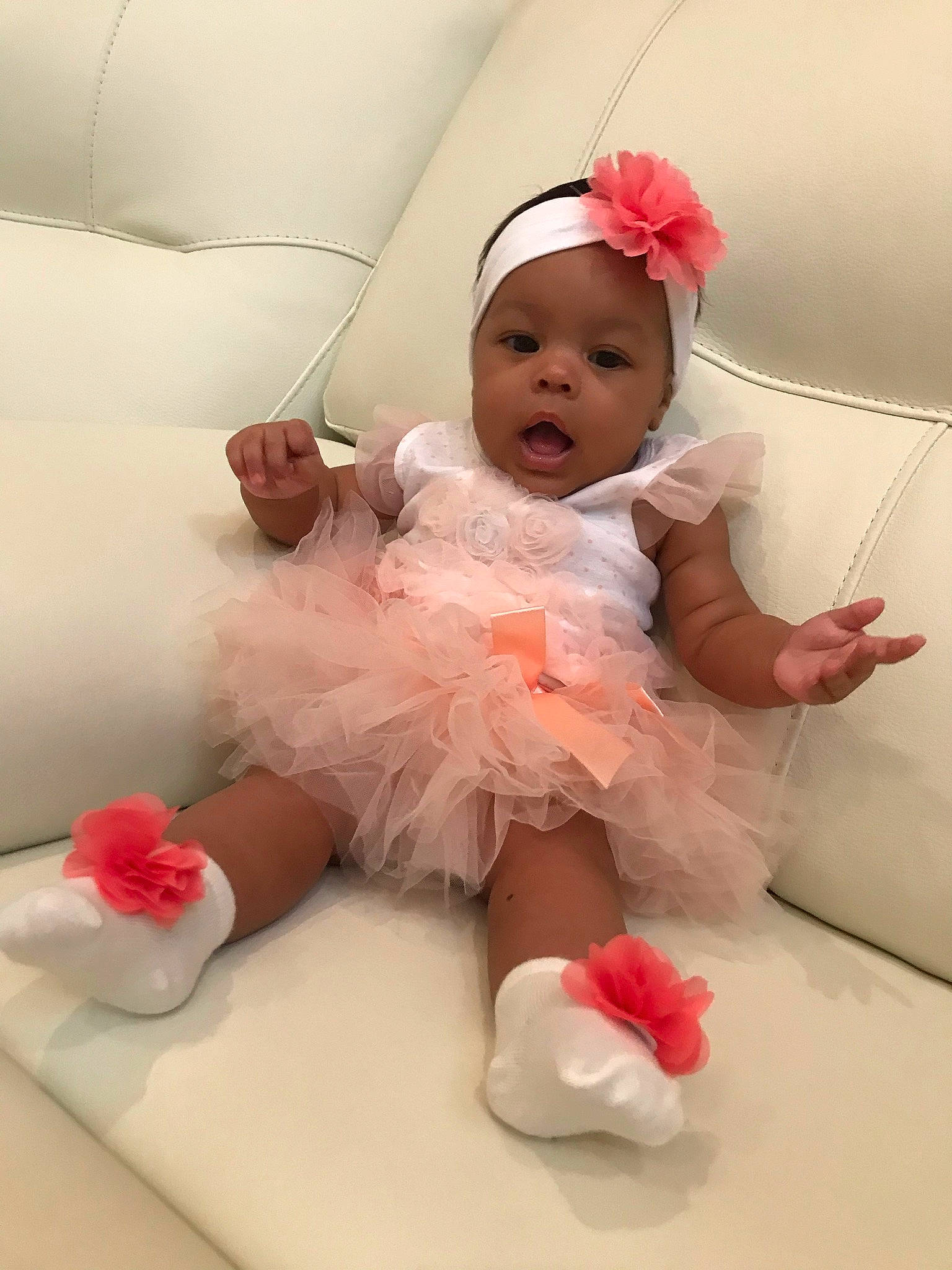 Lailani joined the competition — help win amazing prizes! baby, baby_toddler_clothing, cheek, child, comfort, costume_hat, facial_expression, fashion_accessory, finger, fun, happy, headband, headgear, headpiece, headwear, peach, person, pink, red, room