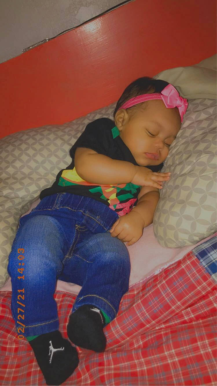 Lailani joined the competition — help win amazing prizes! baby, baby_toddler_clothing, child, comfort, finger, flooring, fun, human_leg, knee, lap, leg, leisure, person, plaid, sitting, skin, sock, tartan, textile, thigh