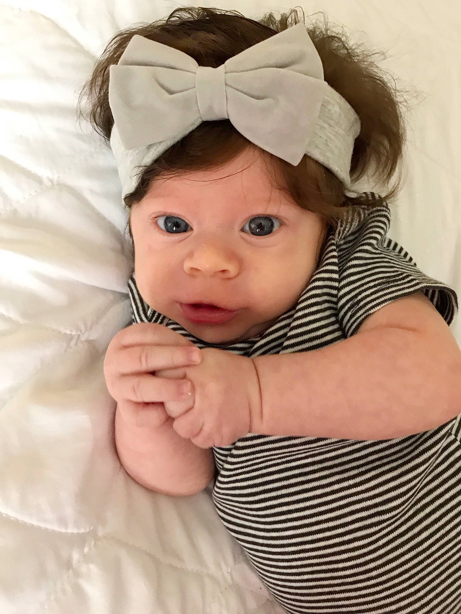 Delaney  joined the competition — help win amazing prizes! baby, baby_products, baby_sleeping, cheek, child, ear, eye, face, hair_accessory, hand, head, headgear, headwear, linens, nose, person, product, skin, smile, toddler
