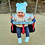 Giorgia a rejoint le concours — aidez-le/la à gagner de superbes lots ! baby, child, swing, playground, hat, pom_poms, smiling, happy, outdoor, clothing, shoes, chains, seat, person, cute, fun, play, young, park, leisure