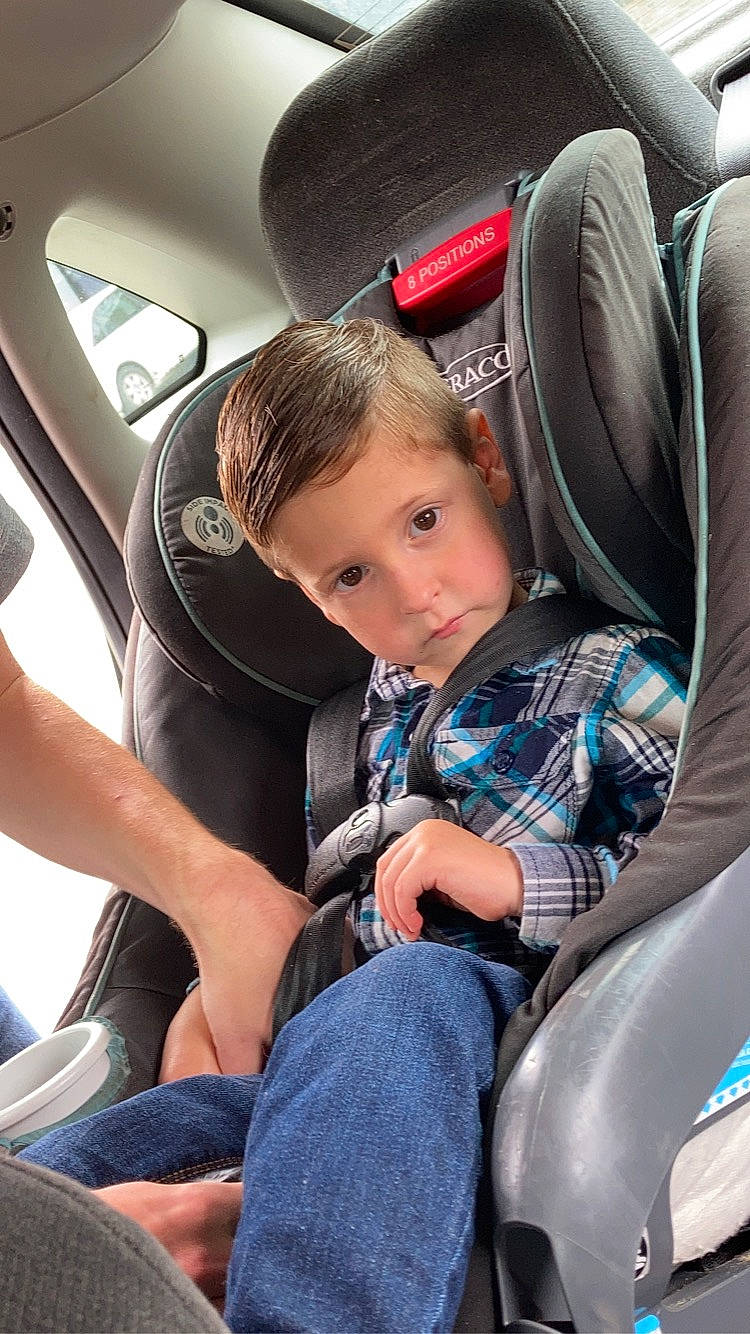 Bryce is registered to the contest to win money with this photo: auto_part, automotive_design, car, car_seat, car_seat_cover, child, comfort, family_car, head_restraint, jeans, lap, mode_of_transport, motor_vehicle, person, personal_luxury_car, seat_belt, steering_part, steering_wheel, toddler, vehicle