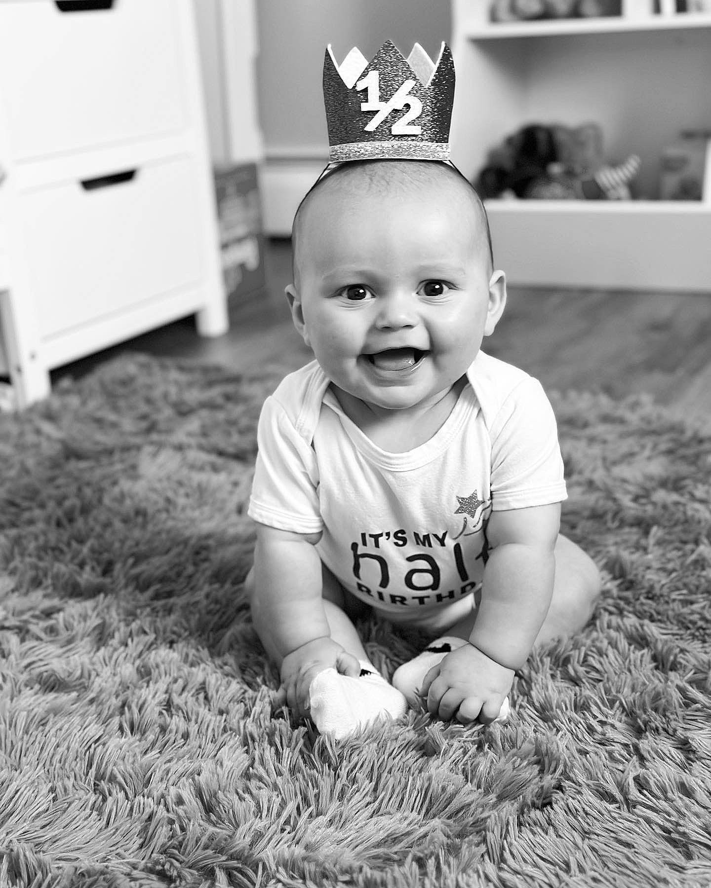 Vincenzo joined the competition — help win amazing prizes! baby, baby_toddler_clothing, black, black_and_white, eye, flash_photography, flooring, grass, happy, mammal, people, people_in_nature, person, photograph, skin, smile, standing, style, tiara, toddler