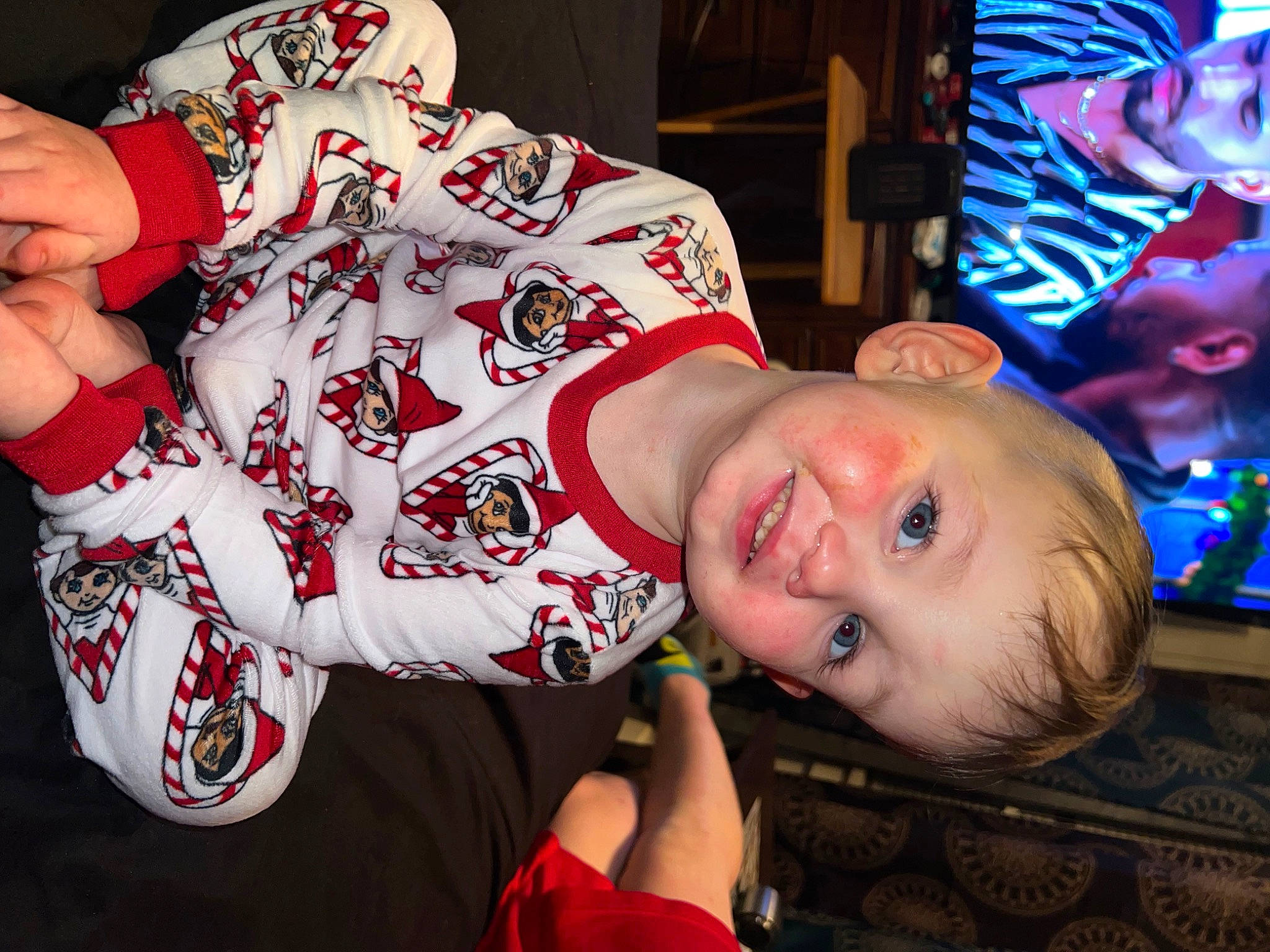 Jonathan joined the competition — help win amazing prizes! carmine, cheek, child, christmas, cool, elbow, event, flash_photography, flesh, fun, happy, holiday, mouth, pattern, person, room, sitting, sleeve, smile, t_shirt