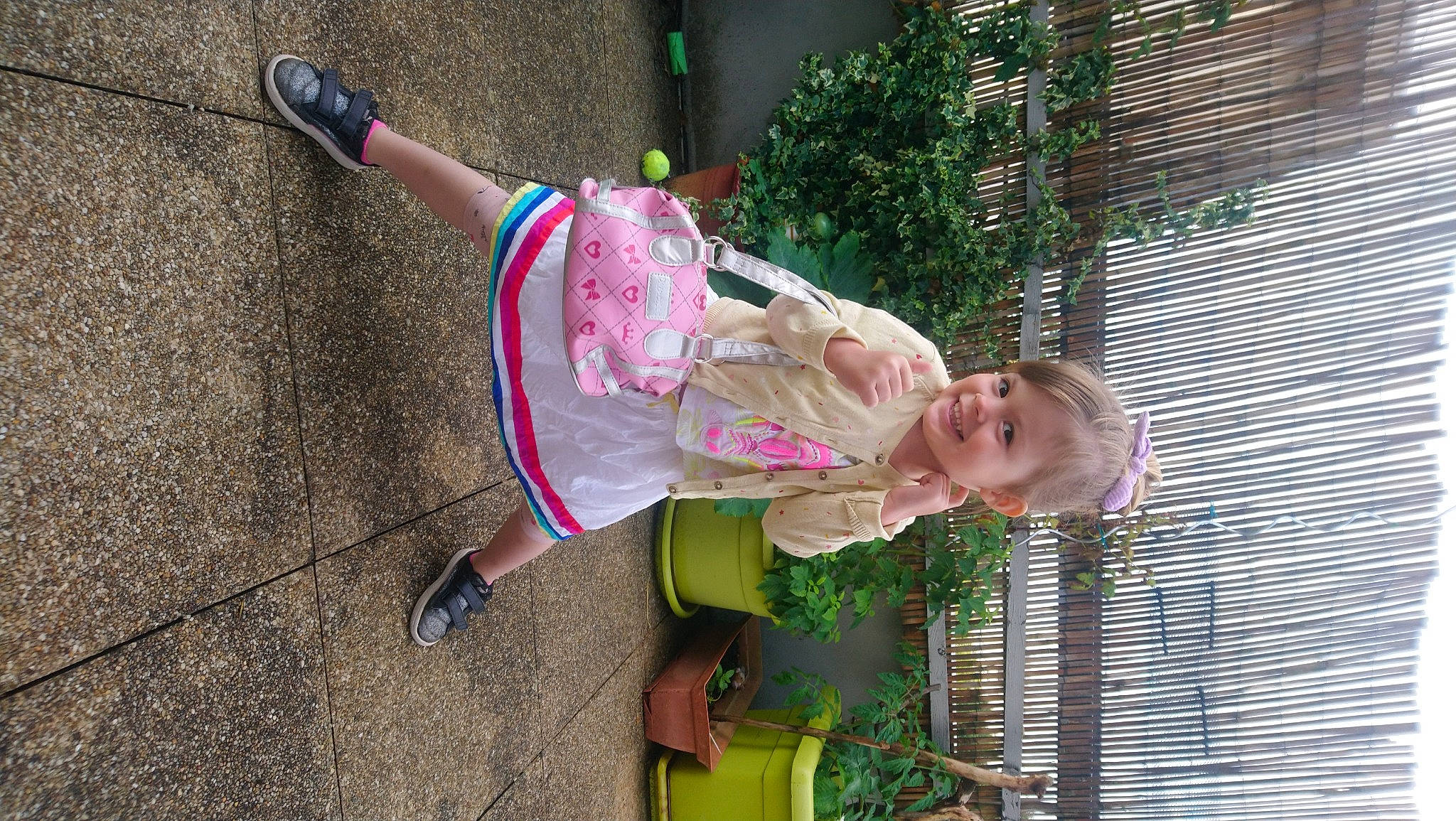 Manon participe au concours pour gagner de l'argent avec cette photo : baby, baby_toddler_clothing, child, city, fun, grass, happy, human_leg, joy, leisure, magenta, person, pink, play, recreation, sandal, shoe, smile, sneakers, toddler