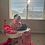 Amaia is registered to the contest to win money with this photo: baby, walker, toy, pink, window, sunlight, indoor, child, floor, blinds, shadow, curious, cute, person, pajamas, playful, home, furniture, floor_tiles, sunbeam