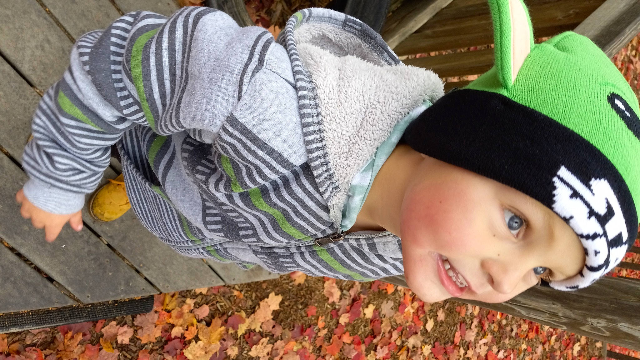 Mason joined the competition — help win amazing prizes! cap, cool, fun, grass, happy, hat, headgear, headwear, human_body, leaf, leisure, mammal, outerwear, pattern, people_in_nature, person, plant, sun_hat, toddler, tree