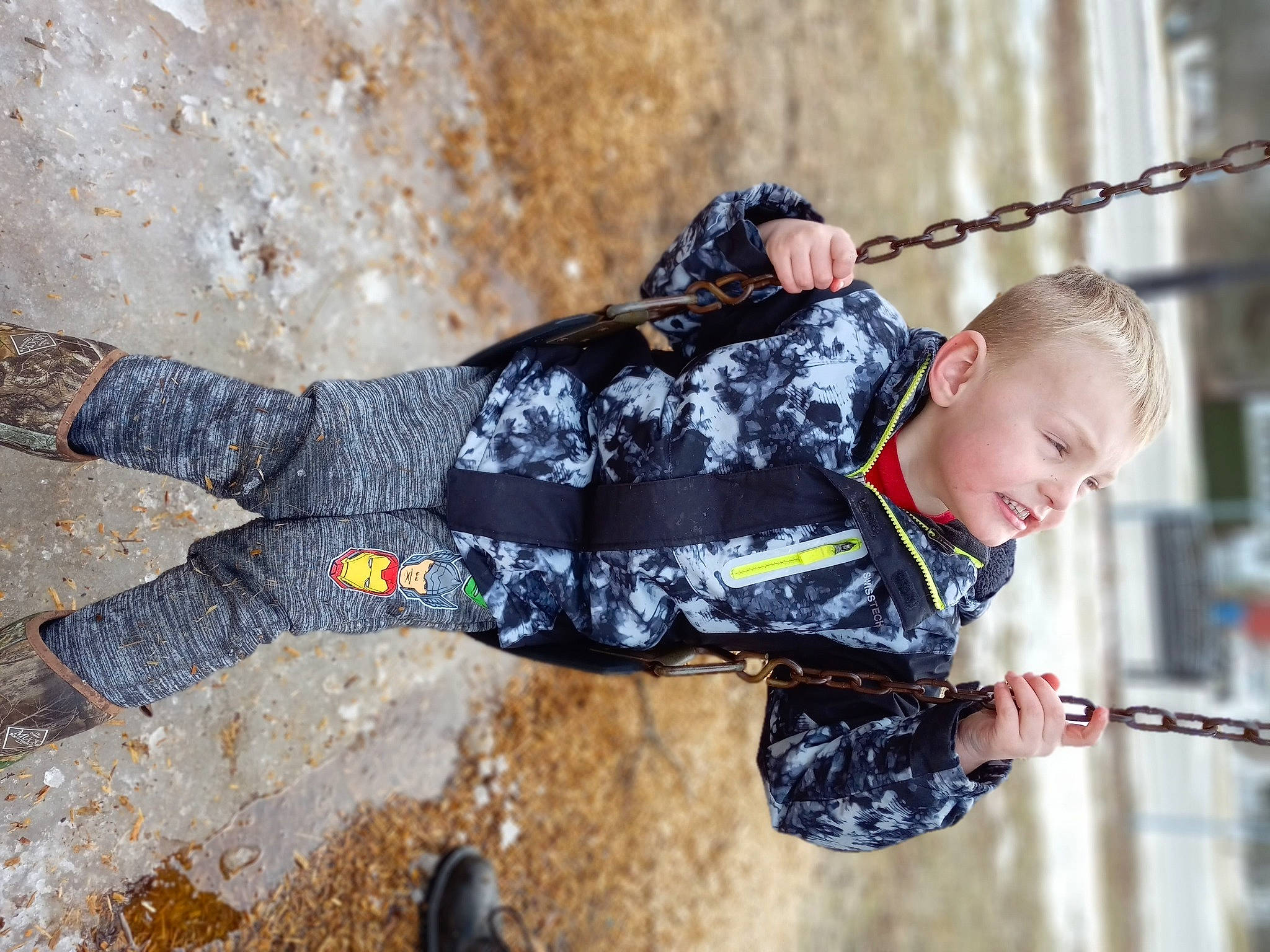 Mason is registered to the contest to win money with this photo: adventure, baby, child, fun, grass, happy, human_body, leisure, outdoor_play_equipment, people_in_nature, person, play, portrait_photography, recreation, rock, rope, soil, street_fashion, toddler, tree