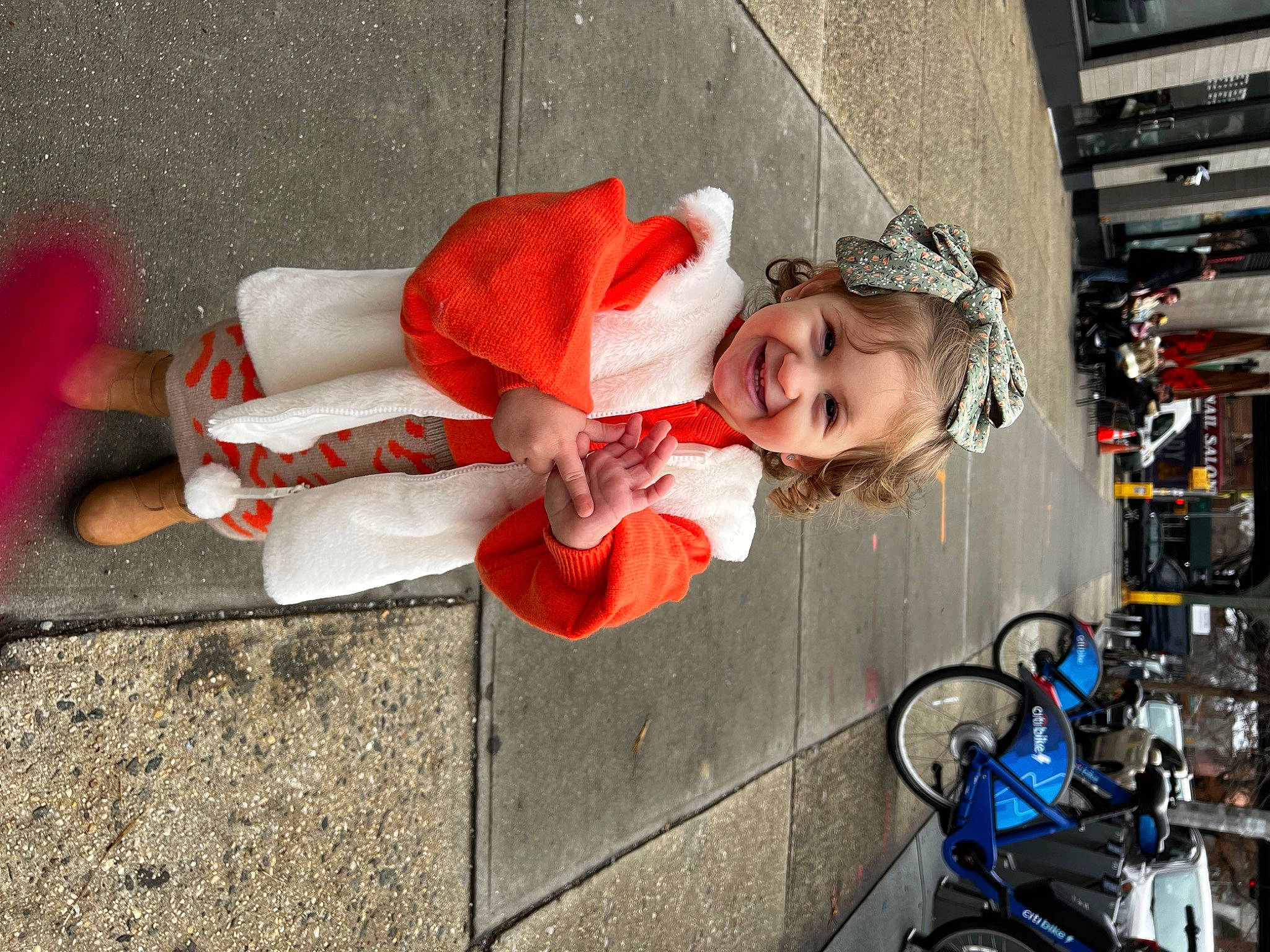 Fotini is registered to the contest to win money with this photo: bicycle, bicycle_fork, bicycle_frame, bicycle_handlebar, bicycle_part, bicycle_tire, bicycle_wheel, bicycles_equipment_and_supplies, fun, hat, helmet, joy, leg, person, recreation, sidewalk, smile, thigh, tire, toddler