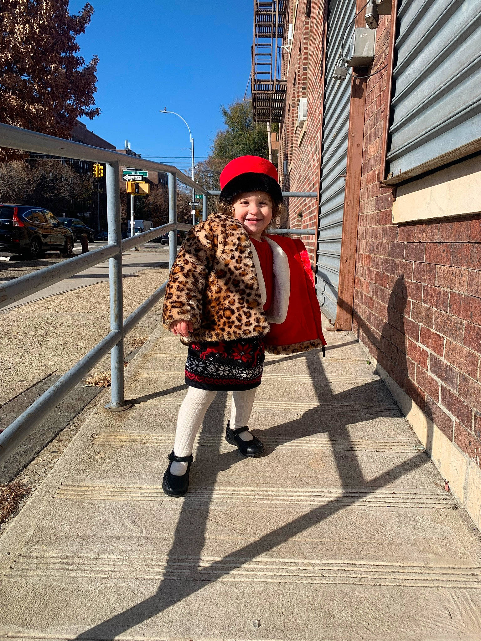 Fotini is registered to the contest to win money with this photo: asphalt, bag, dress, eyewear, glasses, hat, headgear, headwear, jacket, jeans, joy, luggage_and_bags, person, plaid, road_surface, sidewalk, sky, street_fashion, tartan, tints_and_shades