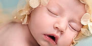 Harper is registered to the contest to win money with this photo: adorable, baby, calm, child, closeup, cute, delicate, face, flower_headband, head, infant, mouth_open, newborn, pastel_background, peaceful, portrait, resting, skin, sleeping, soft_light