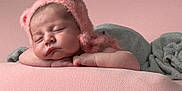 Harper is registered to the contest to win money with this photo: baby, blanket, child, closed_eyes, cozy, cute, fabric, face, flower, hand, hat, infant, newborn, peaceful, pink, portrait, resting, skin, sleeping, soft