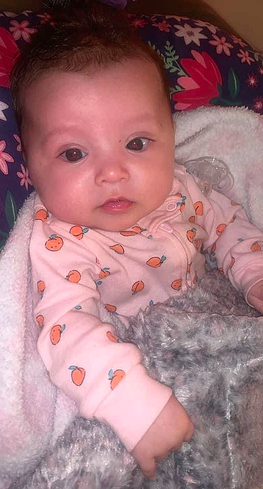 Marloe joined the competition — help win amazing prizes! arm, baby_toddler_clothing, cheek, chin, clothing, comfort, eye, eyebrow, face, facial_expression, hair, hairstyle, hand, head, lip, mouth, nose, outerwear, person, product