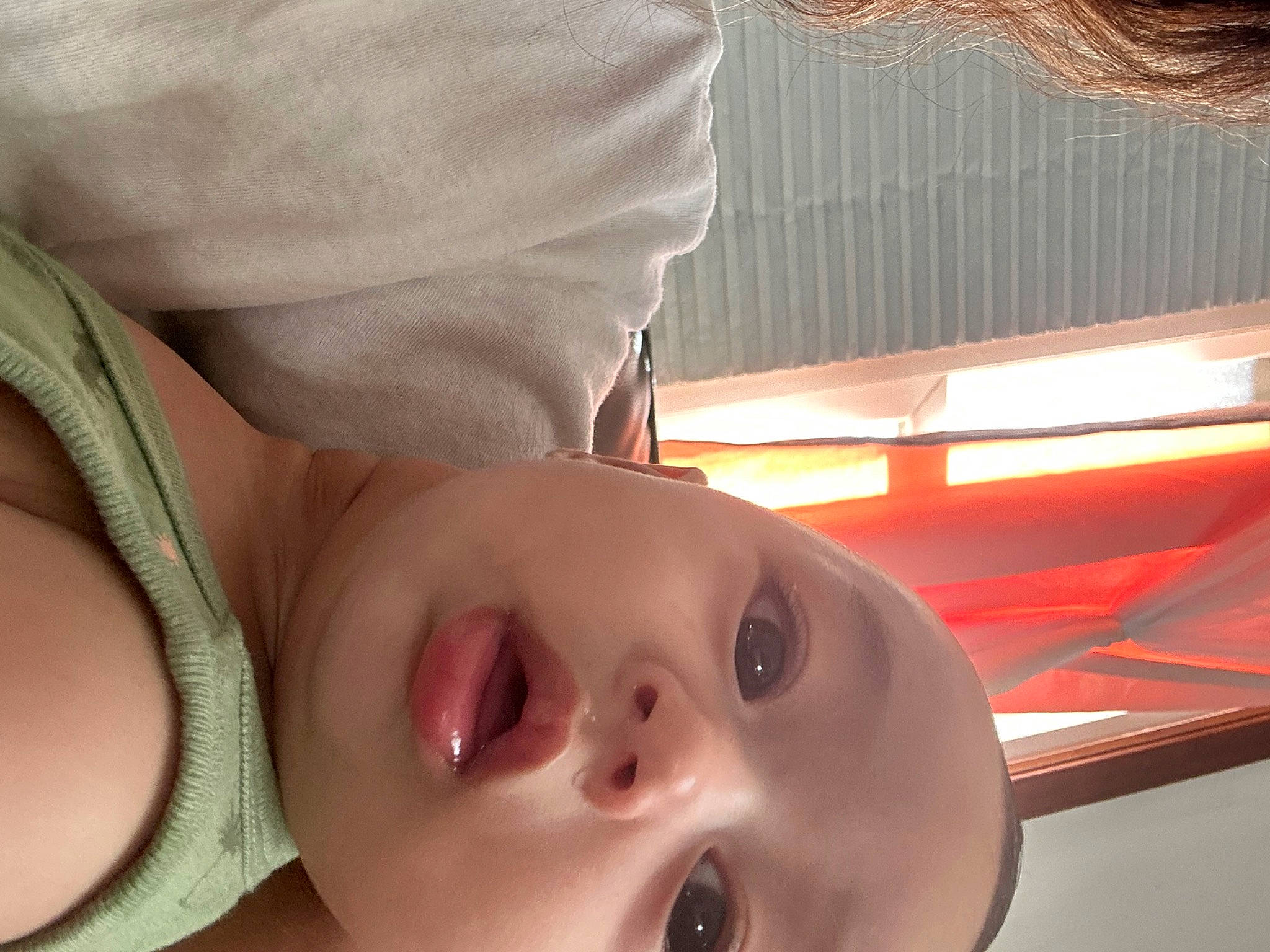 Kyrie is registered to the contest to win money with this photo: baby, baby_toddler_clothing, cheek, child, comfort, curtain, ear, eyelash, fun, happy, mouth, nose, person, portrait_photography, room, skin, smile, toddler, wood