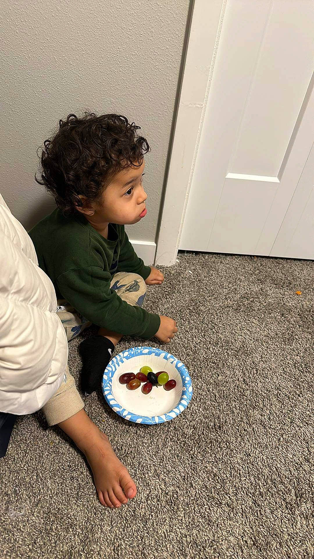 Aiden is registered to the contest to win money with this photo: baby_playing_with_toys, baby_toddler_clothing, child, circle, comfort_food, cooking, cuisine, door, floor, flooring, food, fun, person, platter, play, room, sitting, sleeve, t_shirt, toddler