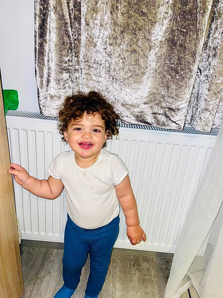 Dominic joined the competition — help win amazing prizes! baby_toddler_clothing, clothing, curtain, denim, electric_blue, flooring, fun, happy, human_body, joy, leg, leisure, person, sleeve, smile, stairs, standing, t_shirt, textile, toddler