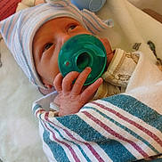 Summer joined the competition — help win amazing prizes! newborn, baby, infant, pacifier, hat, striped_blanket, hospital_blanket, wrapped, sleeping, hand, face, cute, soft, bed, resting, baby_clothes, newborn_hat, skin, indoors, closeup
