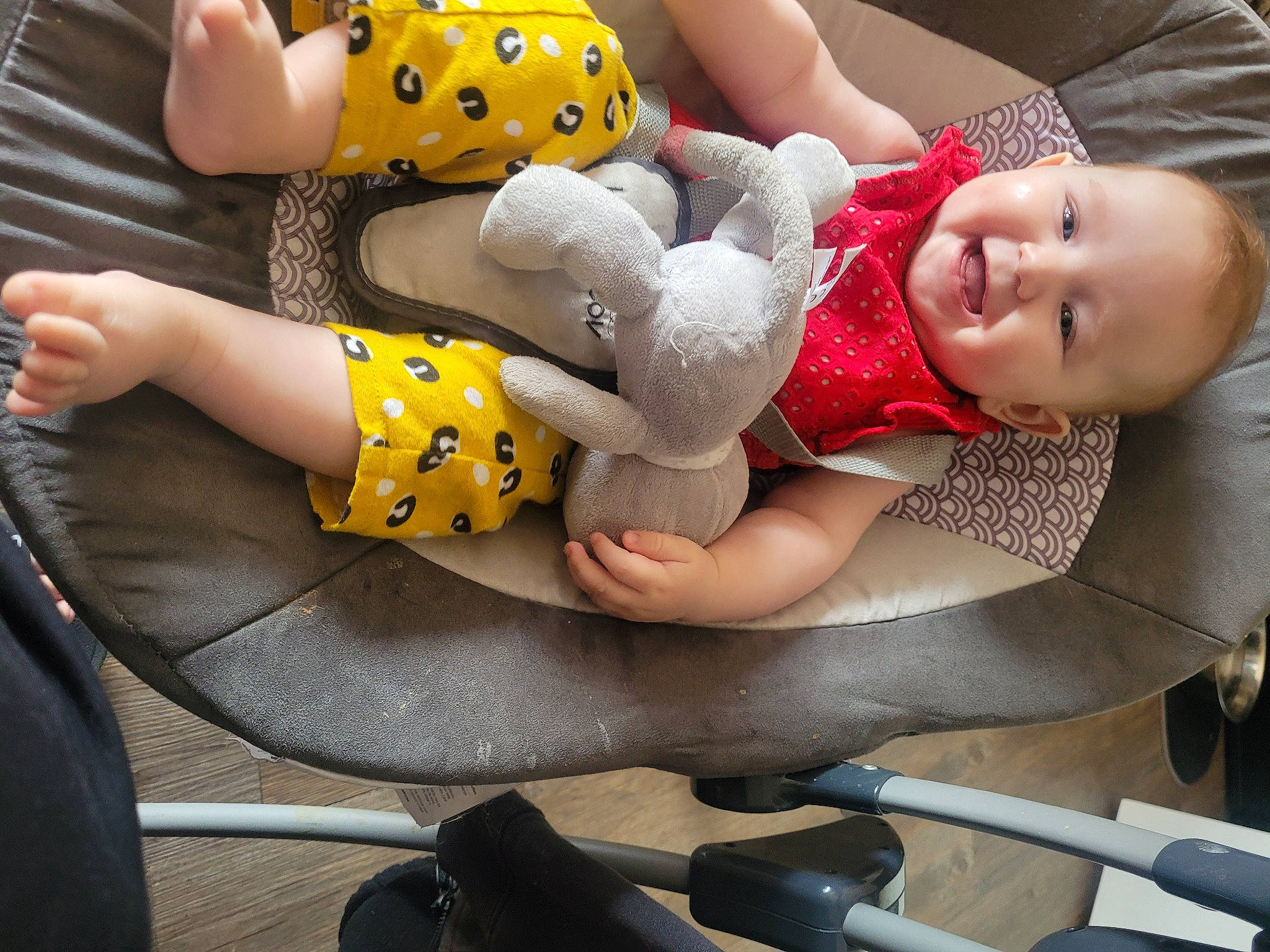 Lindsey participe au concours pour gagner de l'argent avec cette photo : baby, baby_products, baby_toddler_clothing, comfort, finger, fun, happy, human_leg, mouth, pattern, people, person, photograph, product, smile, snapshot, thigh, toddler, toy, white