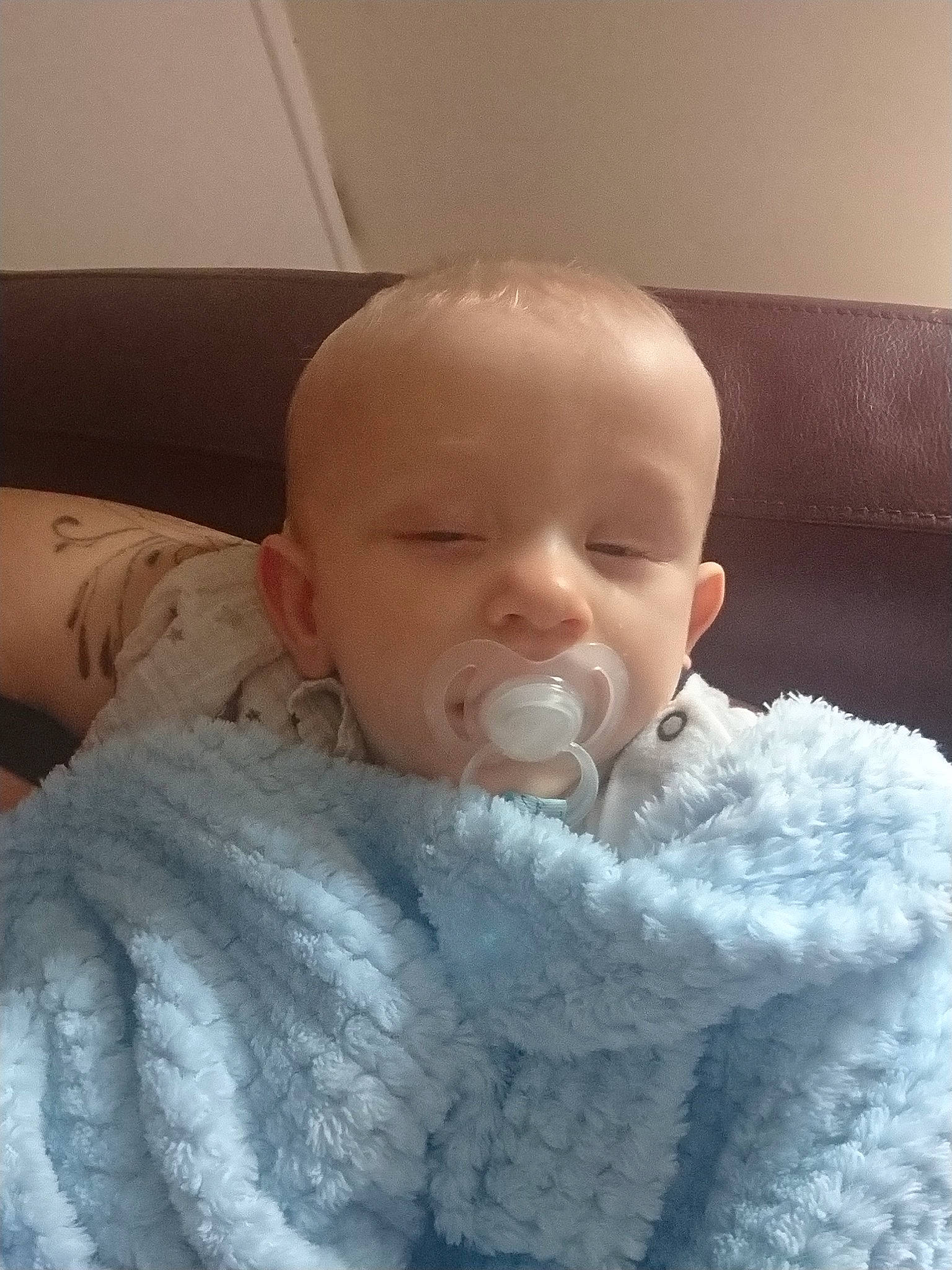 Cruz is registered to the contest to win money with this photo: baby, cheek, child, electronic_device, face, head, lip, mouth, nose, person, skin, toddler, wool