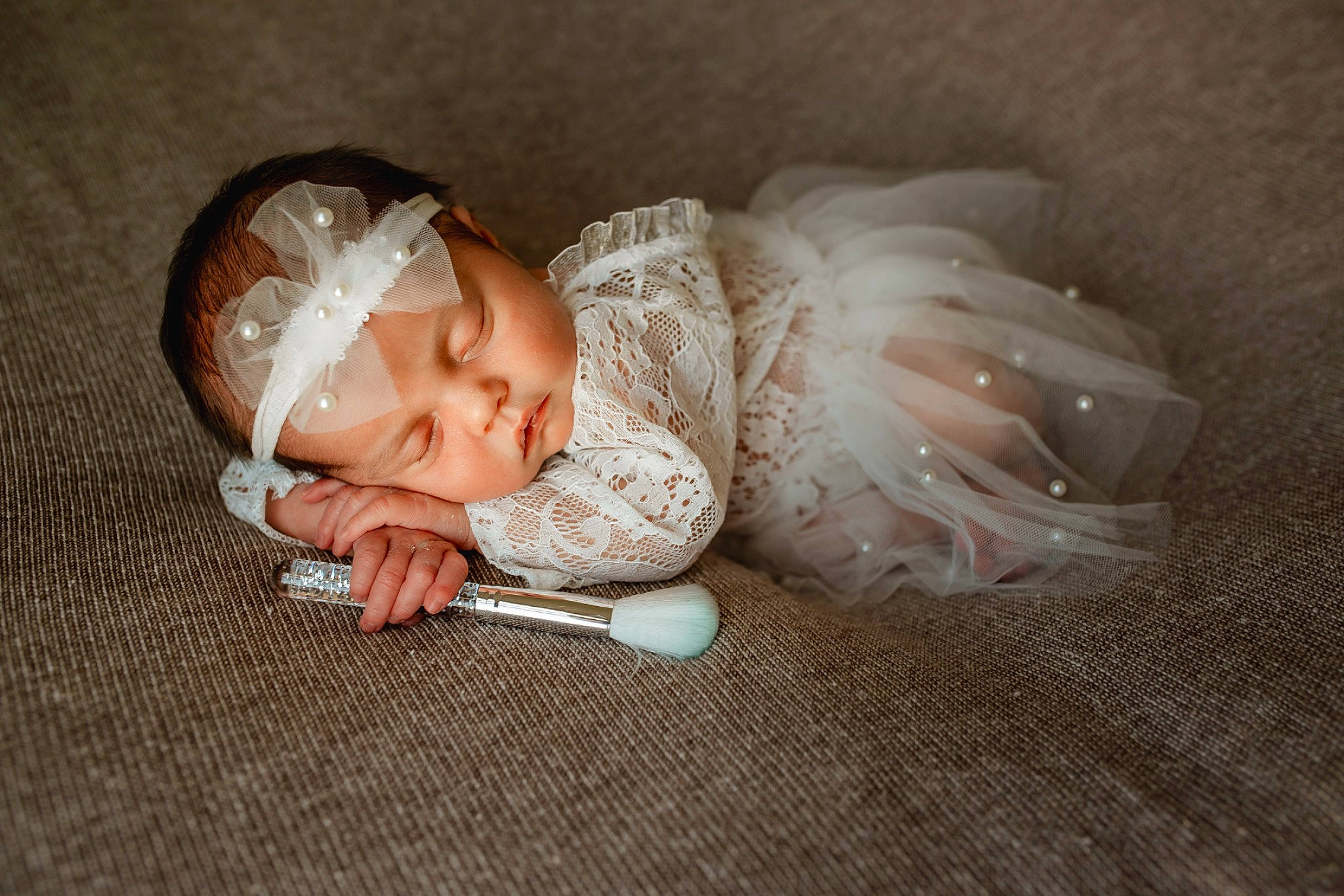 Kinleigh is registered to the contest to win money with this photo: baby, baby_toddler_clothing, child, comfort, dress, embellishment, eye, fashion_accessory, flash_photography, flooring, grass, hair_accessory, hardwood, headpiece, headwear, human_body, linens, person, portrait_photography, sitting