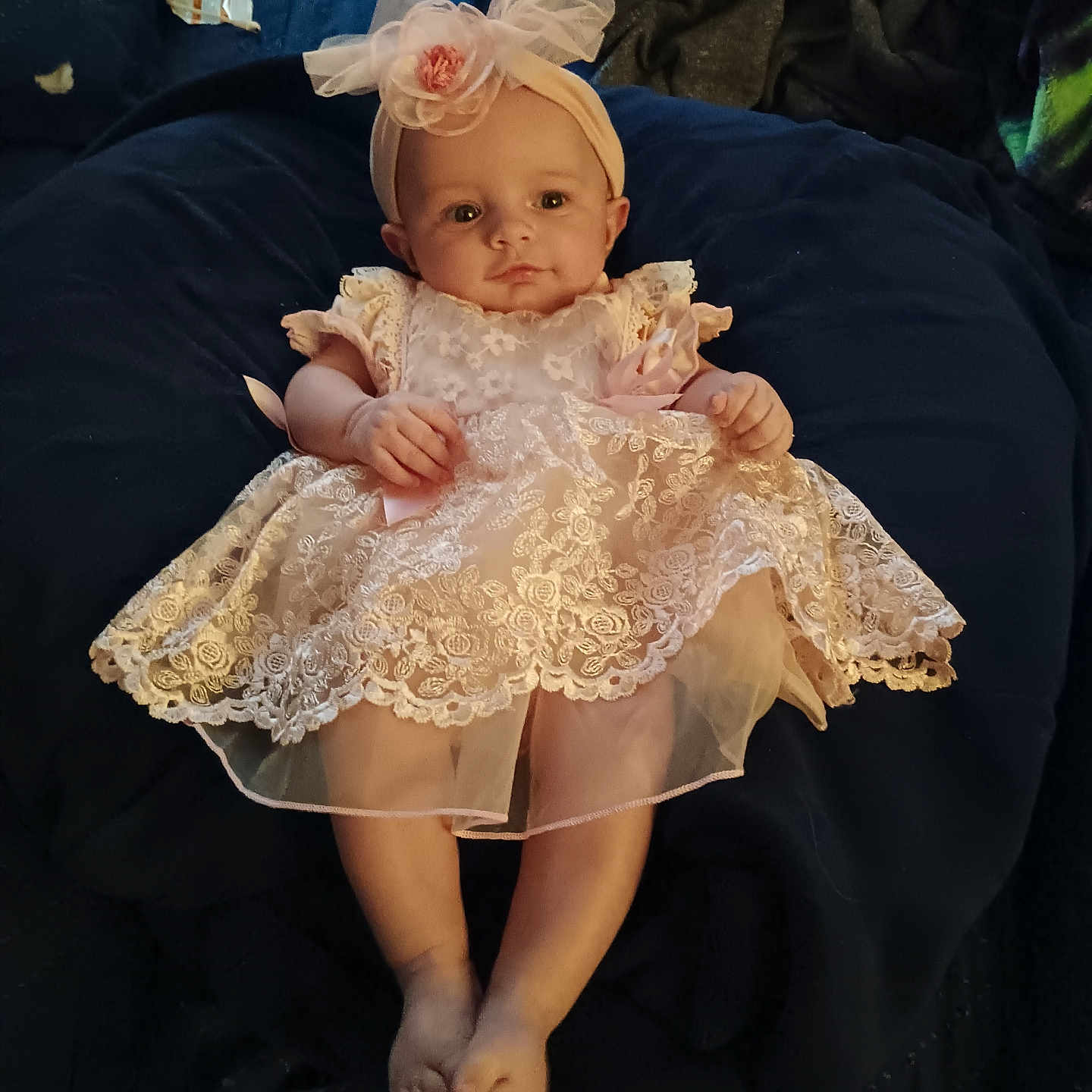 Cheyenne joined the competition — help win amazing prizes! baby, bodypart, bonnet, clothing, couch, dress, eveningdress, face, finger, flower, flowerarrangement, formalwear, furniture, hand, hat, head, person, photography, portrait, toy
