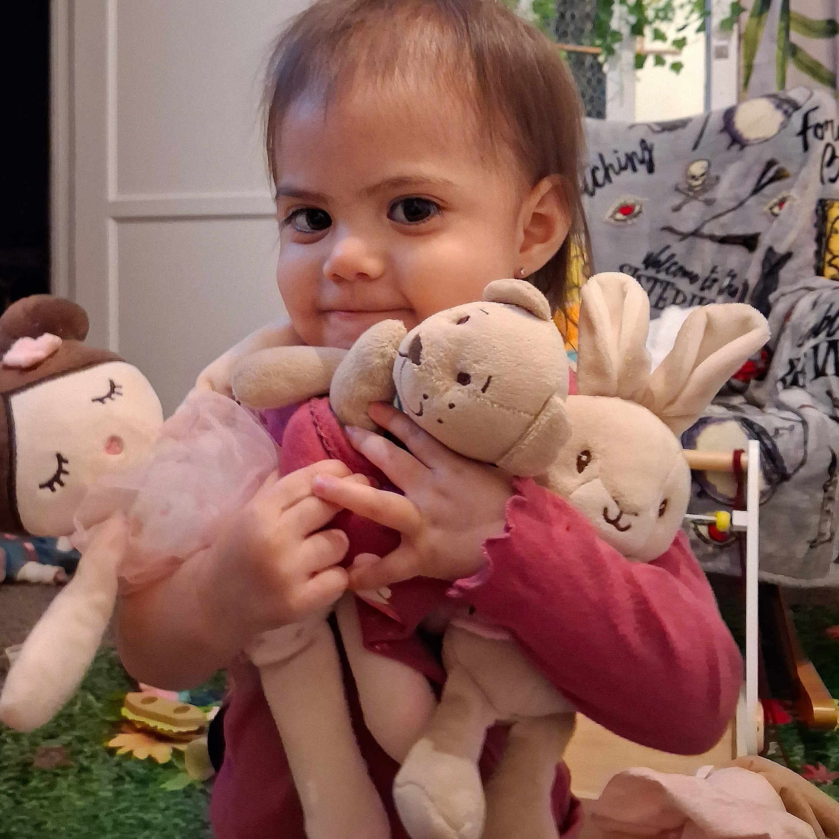 Nita is registered to the contest to win money with this photo: child, toddler, baby, portrait, smiling, happy, indoors, plush_toys, stuffed_animals, bunny, doll, pink_clothing, long_hair, earring, sitting, cuddling, toy_room, cozy, playroom, photography