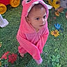 Nita is registered to the contest to win money with this photo: animal_hood, baby, child, colorful, cute, face, flower_pattern, hooded_outfit, indoor, looking_at_camera, pink_clothing, play_mat, playroom, portrait, safe, sitting, toddler, toy_car, toy_vehicle, toys