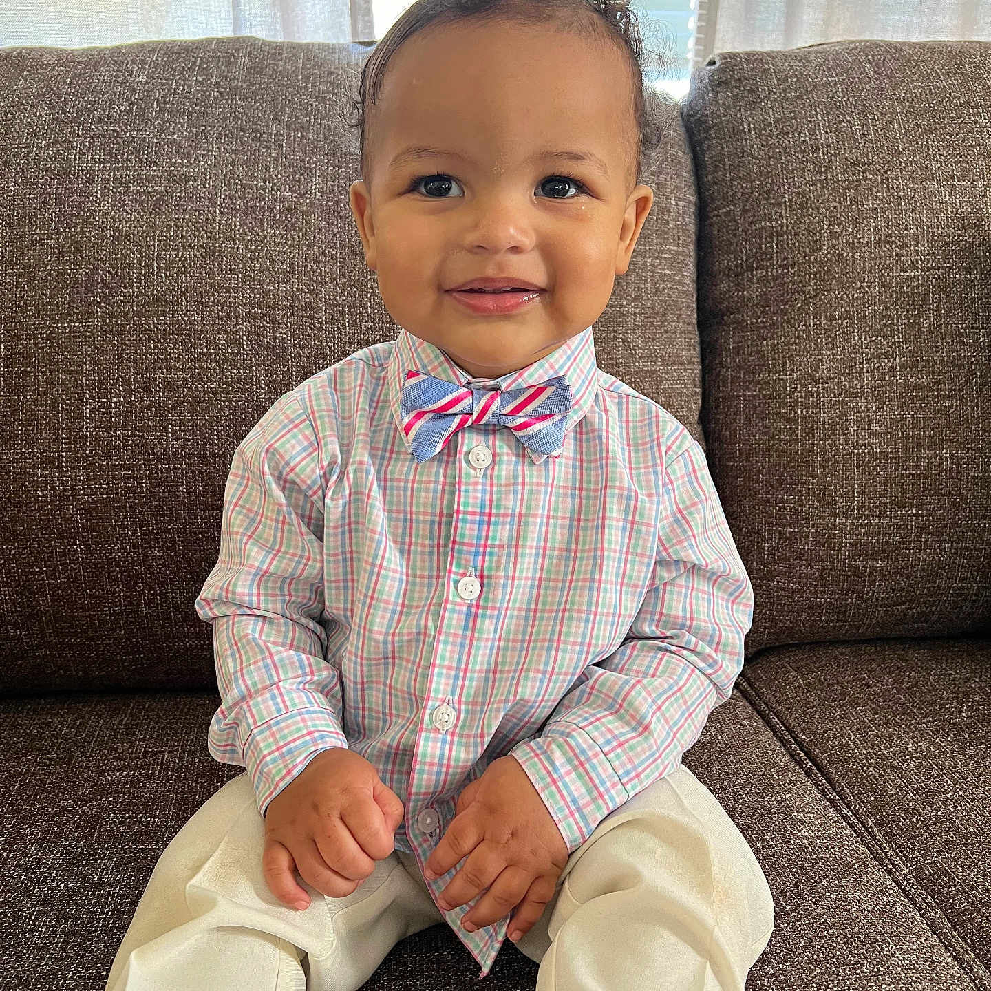 Drayson joined the competition — help win amazing prizes! accessories, baby, bowtie, clothing, couch, face, formalwear, furniture, happy, head, homedecor, pants, person, photography, portrait, shirt, sitting, sleeve, smile, tie