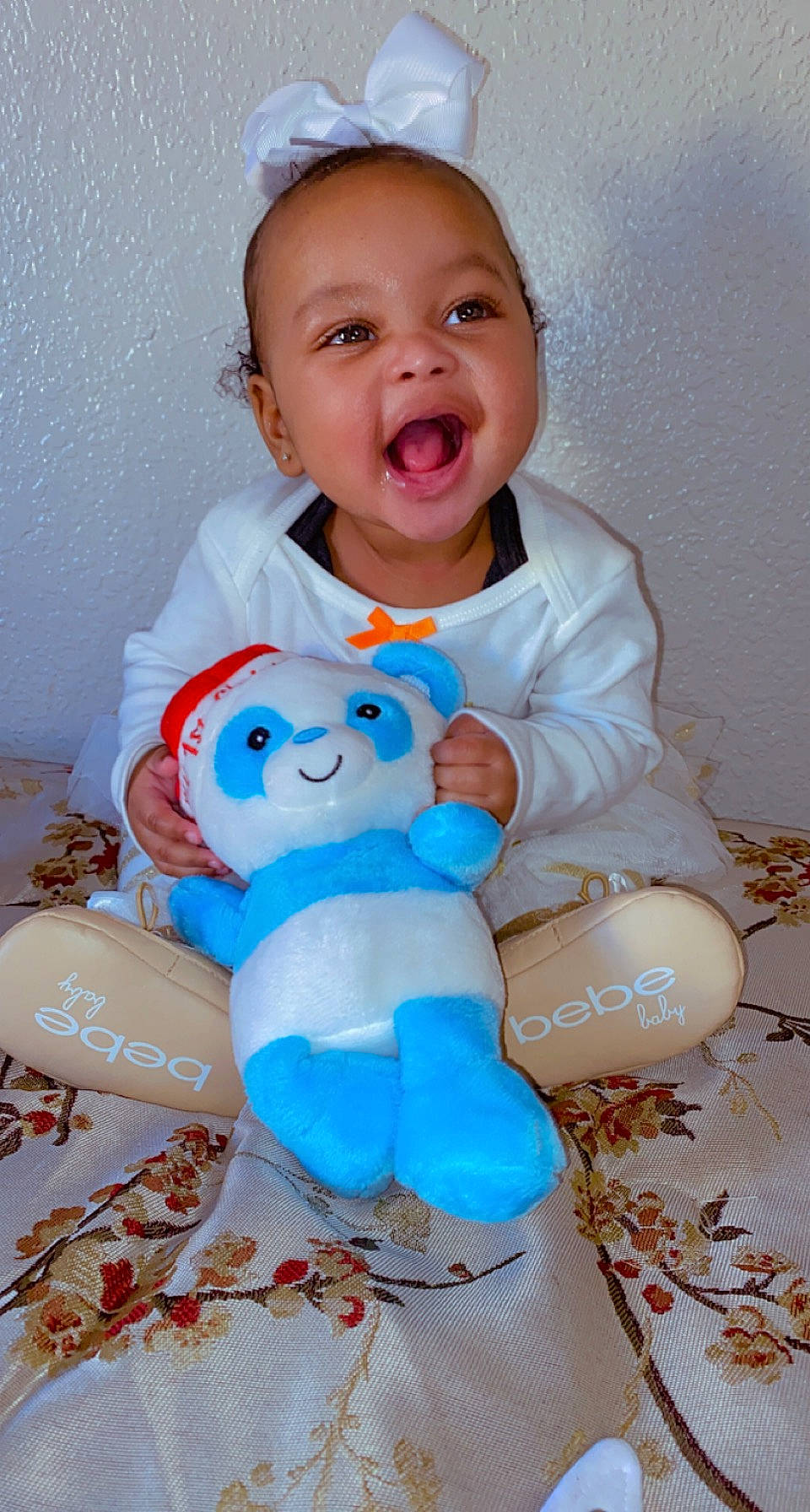 Kaileah joined the competition — help win amazing prizes! aqua, baby, baby_toddler_clothing, cheek, eye, face, finger, happy, head, human_body, person, pink, skin, sleeve, smile, t_shirt, textile, toddler, toy, white