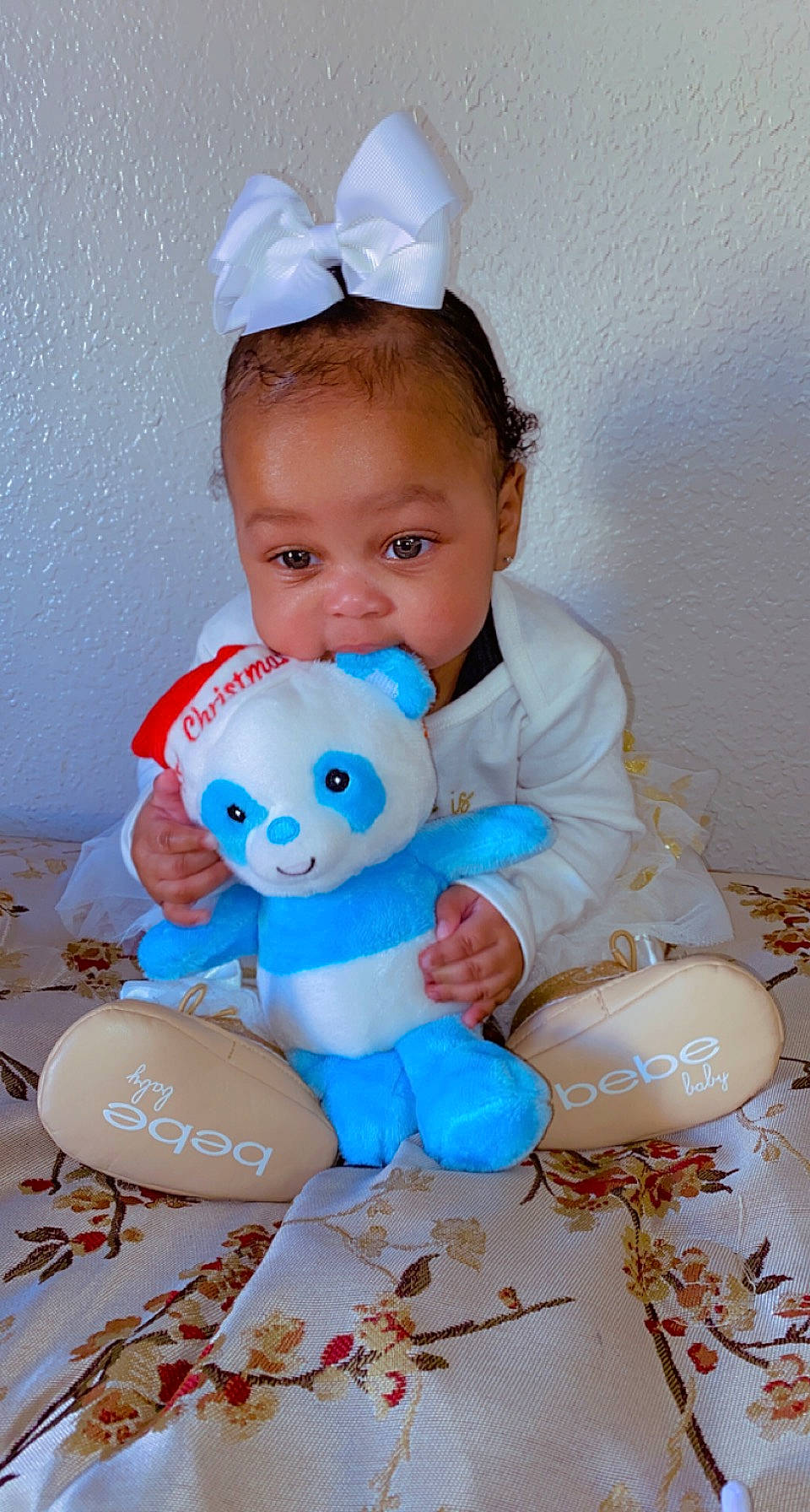 Kaileah is registered to the contest to win money with this photo: arm, baby, baby_products, baby_toddler_clothing, blue, child, event, happy, party_supply, person, pink, product, skin, sleeve, stuffed_toy, teddy_bear, textile, toddler, toy, white