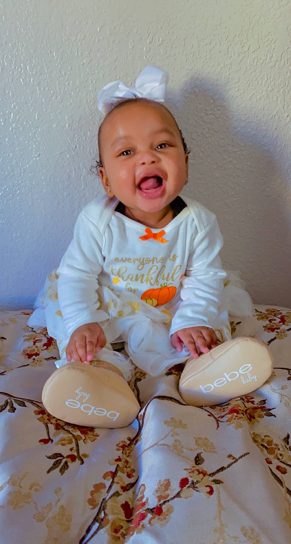 Kaileah joined the competition — help win amazing prizes! baby, baby_playing_with_toys, baby_toddler_clothing, cheek, child, dishware, dress, drinkware, eye, face, facial_expression, finger, happy, head, person, pink, skin, sleeve, smile, toddler