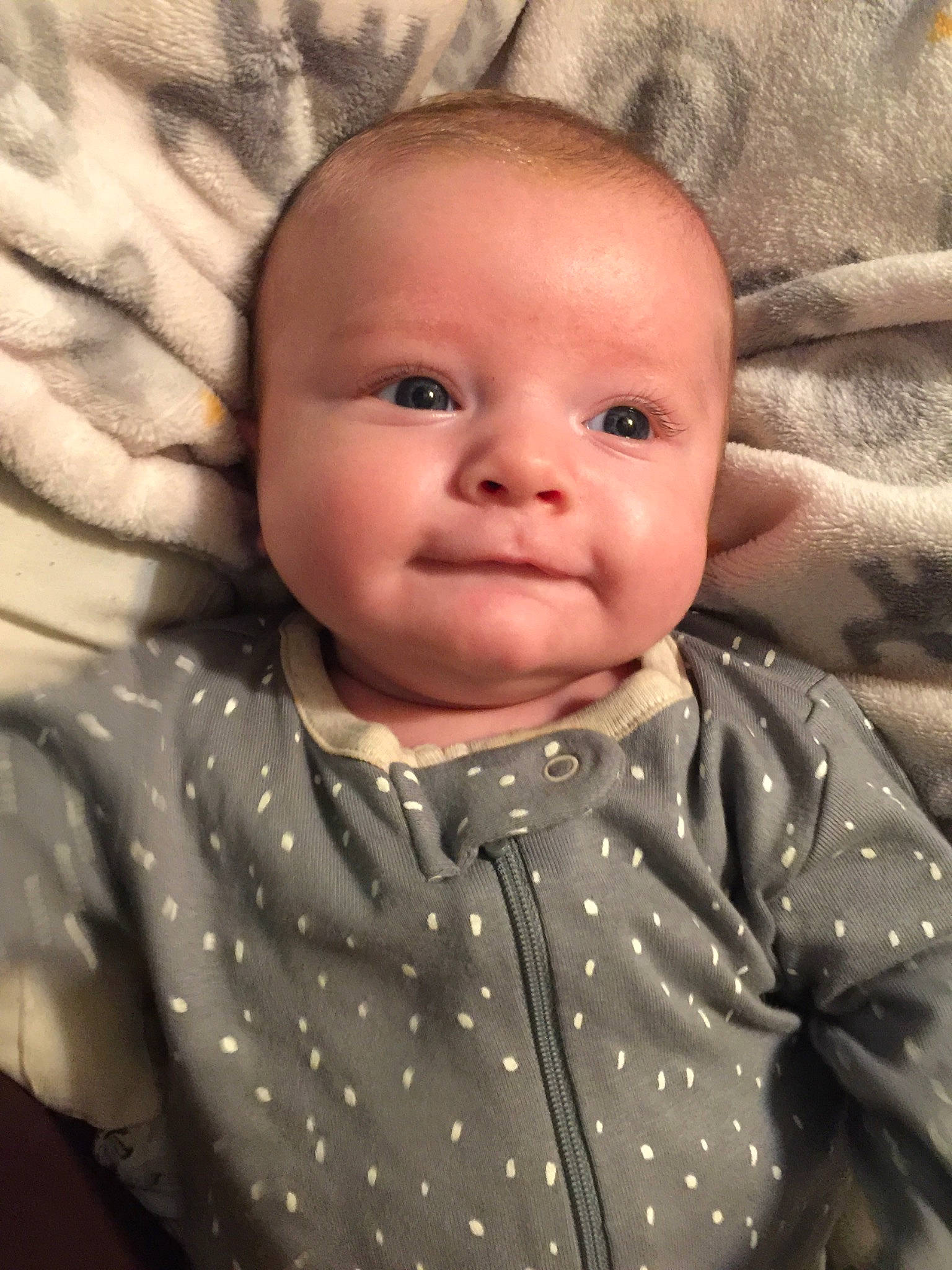 Knox Ryder Parker is registered to the contest to win money with this photo: baby, cheek, child, chin, eye, face, facial_expression, forehead, head, iris, lip, mouth, nose, pattern, person, portrait_photography, skin, smile, toddler