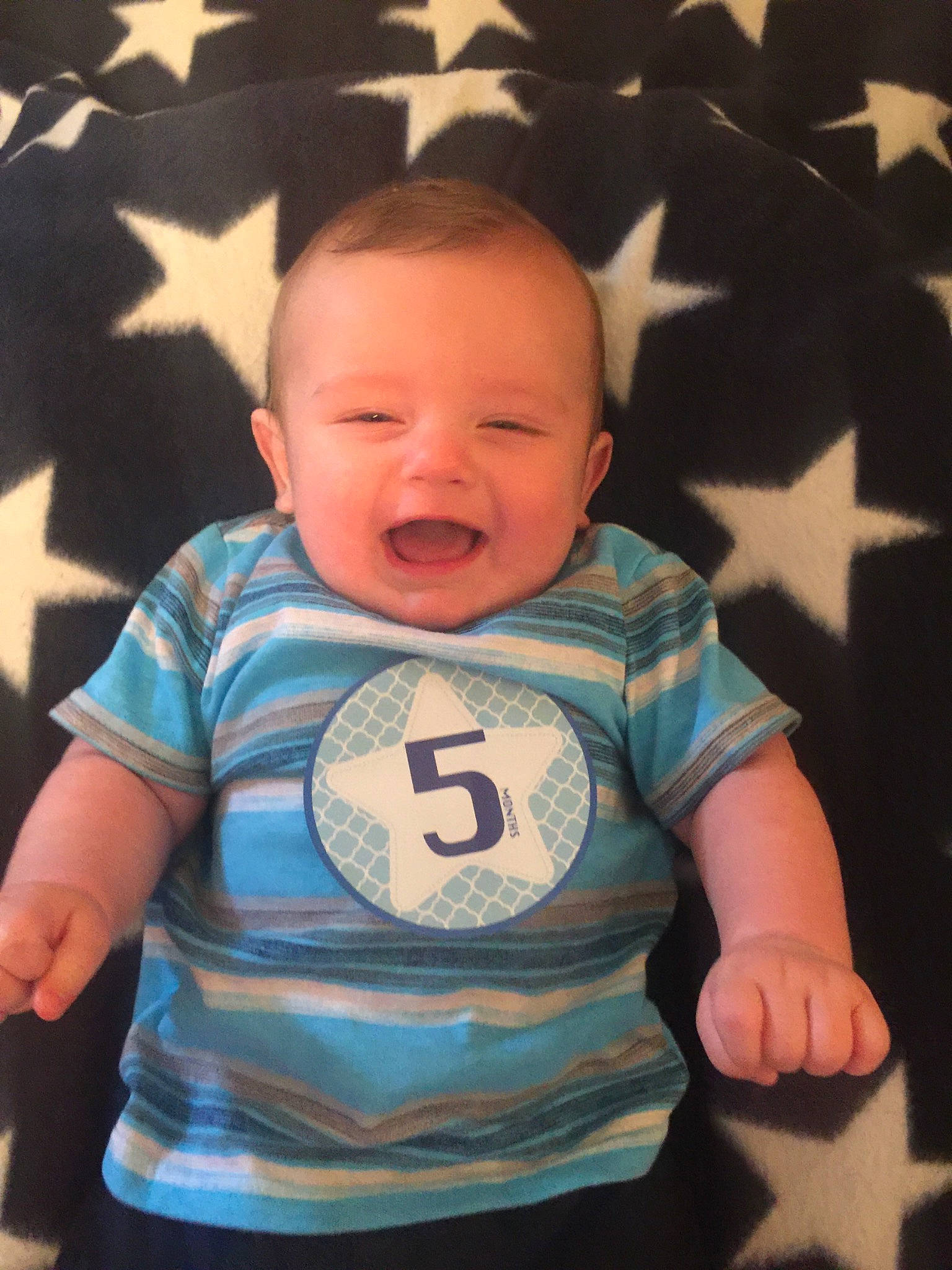 Knox Ryder Parker is registered to the contest to win money with this photo: baby, baby_toddler_clothing, cheek, child, cool, face, facial_expression, fun, head, laugh, mouth, person, product, skin, sleeve, smile, t_shirt, toddler