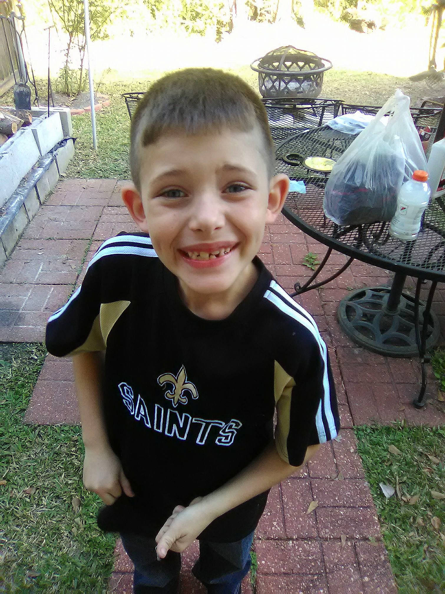 Bradyn joined the competition — help win amazing prizes! child, cool, face, facial_expression, grass, happy, head, joy, people, person, plant, recreation, skin, smile, summer, t_shirt, toddler, tooth, top, tree